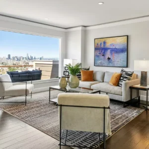 Living room interior with Monet's Impression Sunrise above mid-century modern sofa