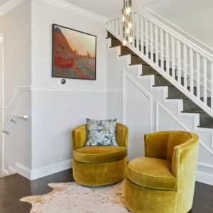 Interior design with Monet's Graynsta, Haystacks above modern sofa