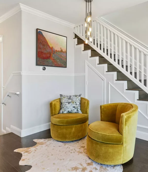 Interior design with Monet's Graynsta, Haystacks above modern sofa